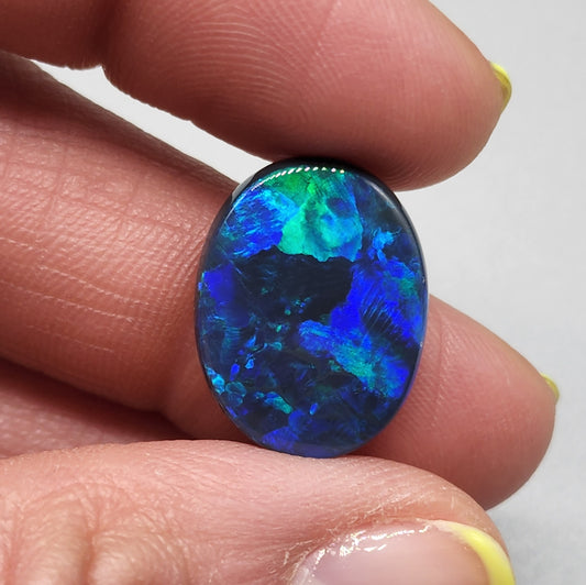 9.9cts  large Black Opal with dark earthy blues and greens and a pitch black body tone of n1-2