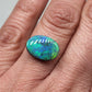 4cts Black Opal with a very Earth like color pallet, small soft patterns with vivid saturation