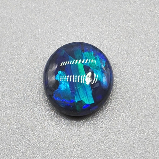 2cts Black Opal with phenomenal blue/green jigsaw pattern