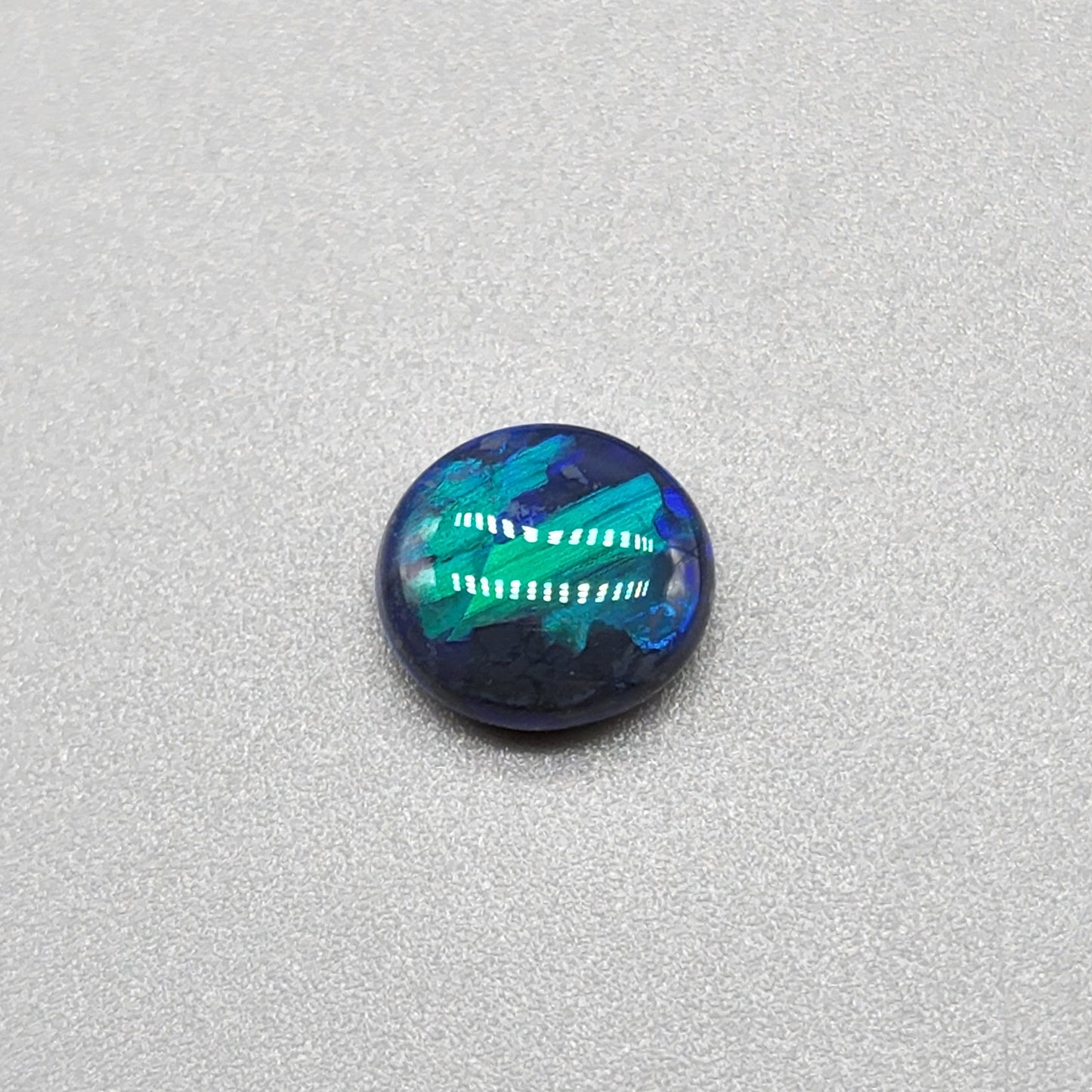 2cts Black Opal with phenomenal blue/green jigsaw pattern