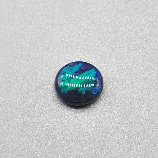 2cts Black Opal with phenomenal blue/green jigsaw pattern