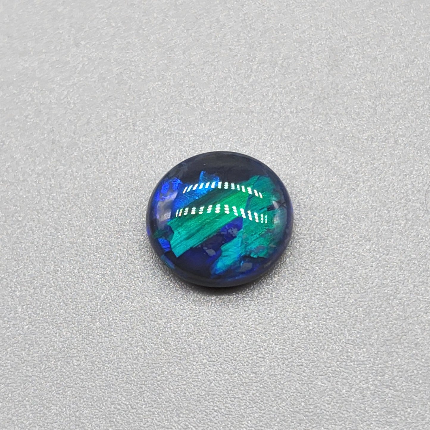 2cts Black Opal with phenomenal blue/green jigsaw pattern