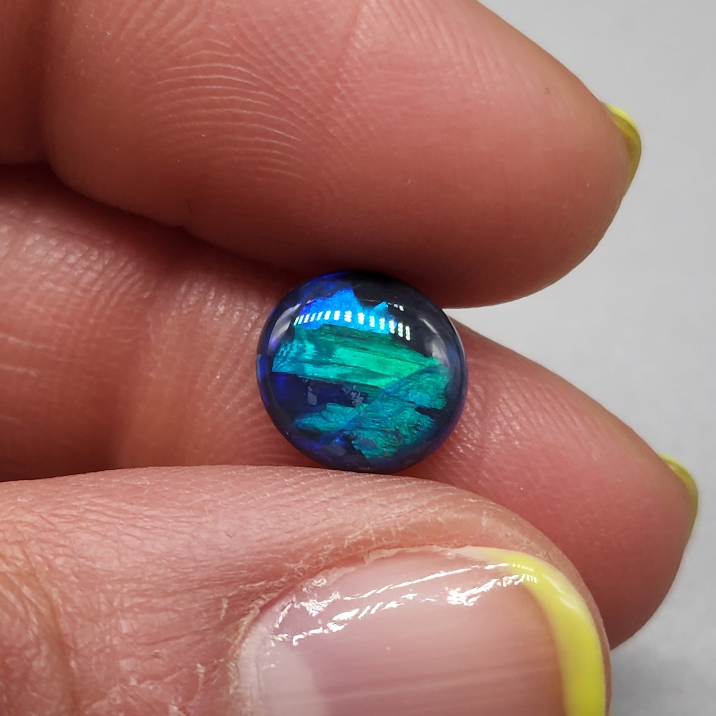 2cts Black Opal with phenomenal blue/green jigsaw pattern