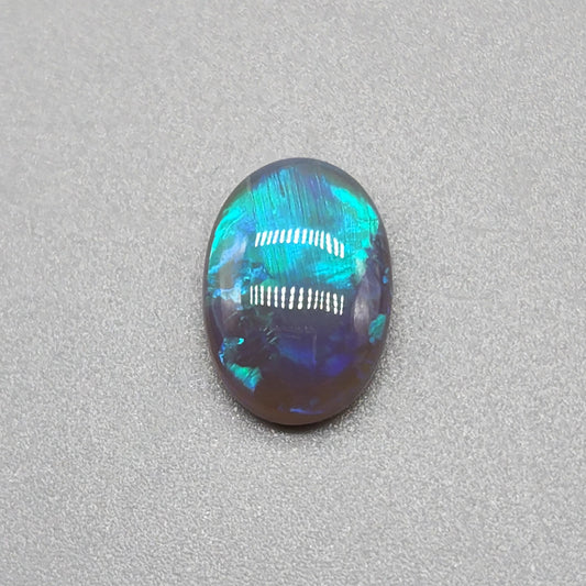 3cts Black Opal with fantastic chaff pattern with a minty green color pallet