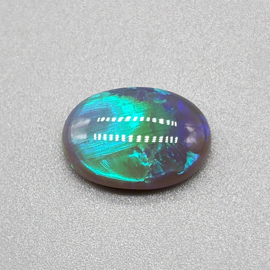 3cts Black Opal with fantastic chaff pattern with a minty green color pallet