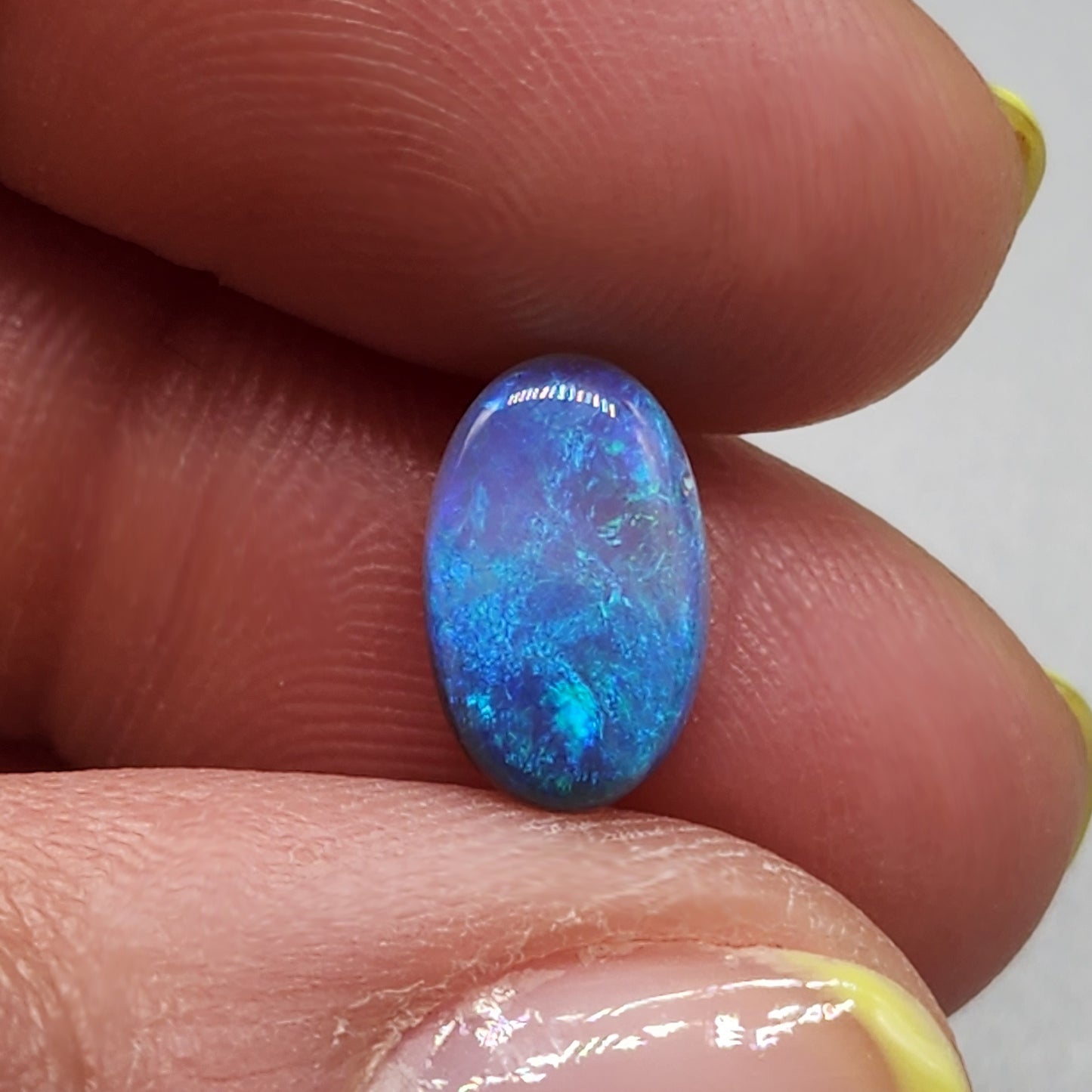 2.4cts Dark opal with an oceanic presence.