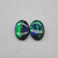 2.4CT Black opal pair with matching vertical bands of rich Green color