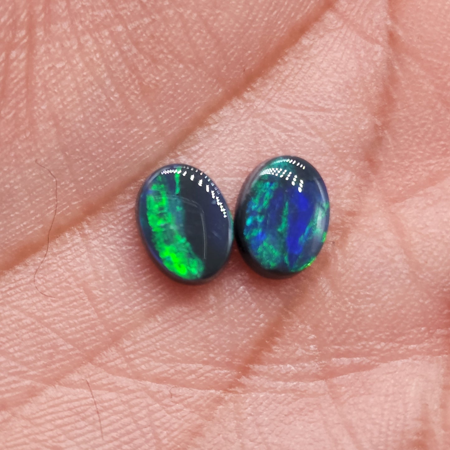 2.4CT Black opal pair with matching vertical bands of rich Green color