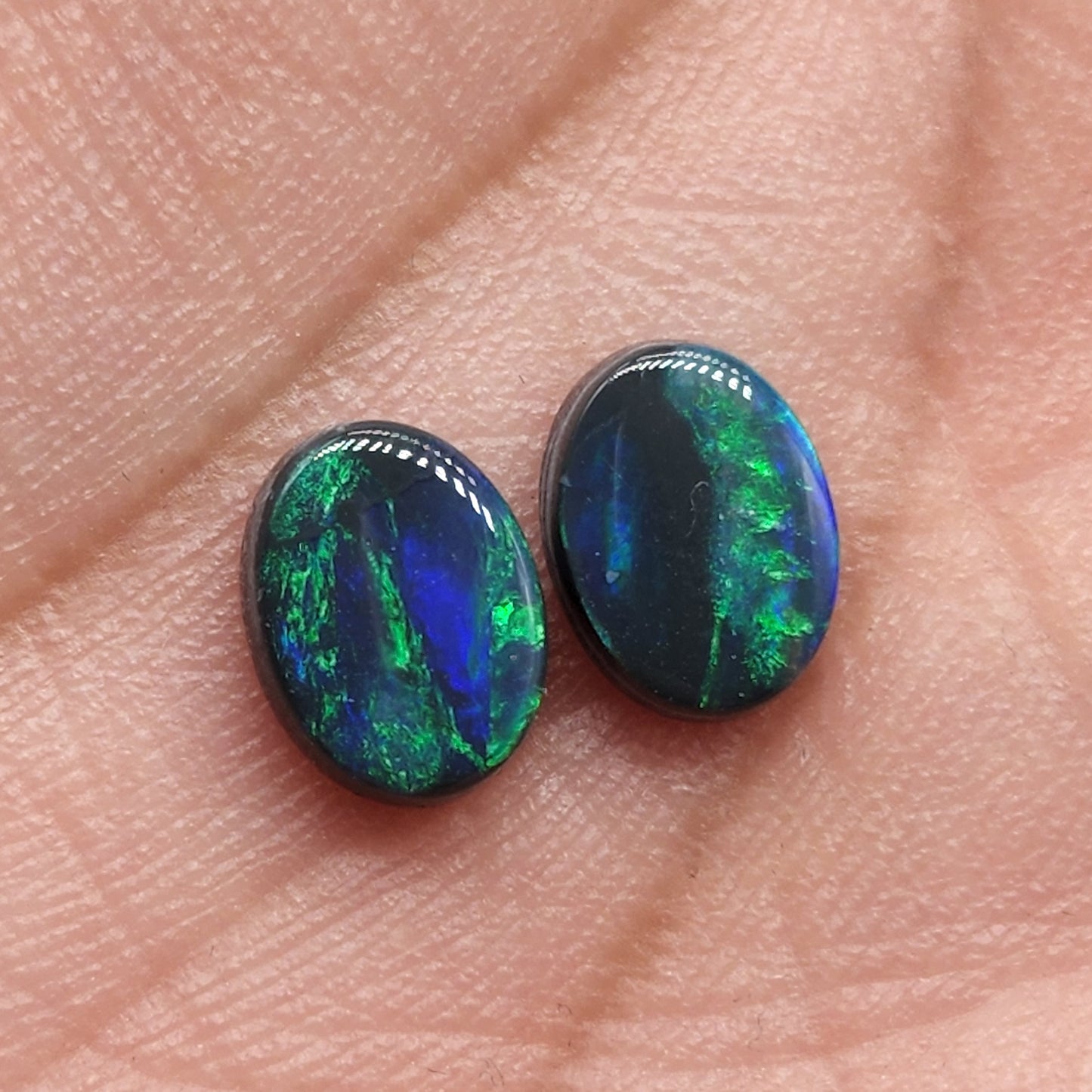 2.4CT Black opal pair with matching vertical bands of rich Green color