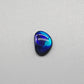 0.95cts Black Opal with rich brush strokes of blue color play fading into a dark center