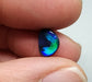 0.95cts Black Opal with rich brush strokes of blue color play fading into a dark center