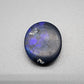 4.9cts Black Opal with well dispersed royal blue play of color