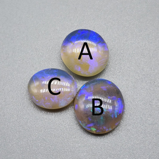 Assorted Crystal Opals with violet play of color and lots of depth.