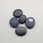 Assorted Black Opals with royal blue color play on a jet black base