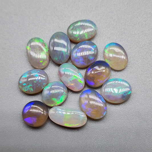 Assorted Dark opals, Crystal Opals with violet and green color play