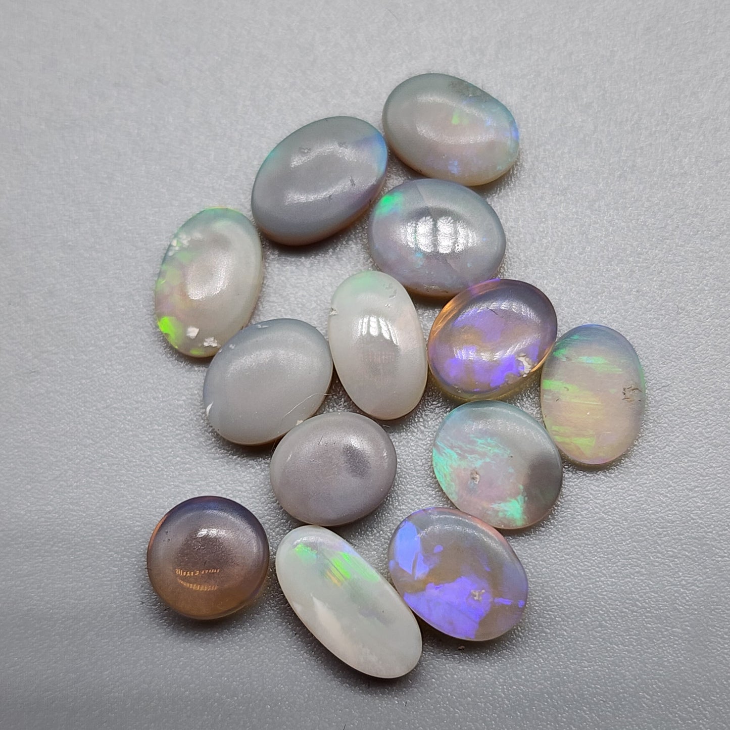 Assorted Dark opals, Crystal Opals with violet and green color play