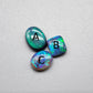 Assorted selection of Crystal and Black opals with vivid blue-green color play and full faced color