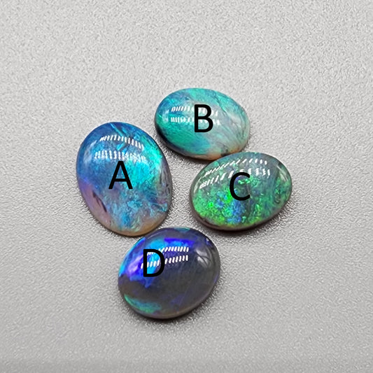 Assorted Dark opals/Black Opals with blue-green color play and mixed patterns