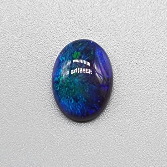 1.55cts Black Opal with small flash pattern and a galactic color scheme of blues and greens